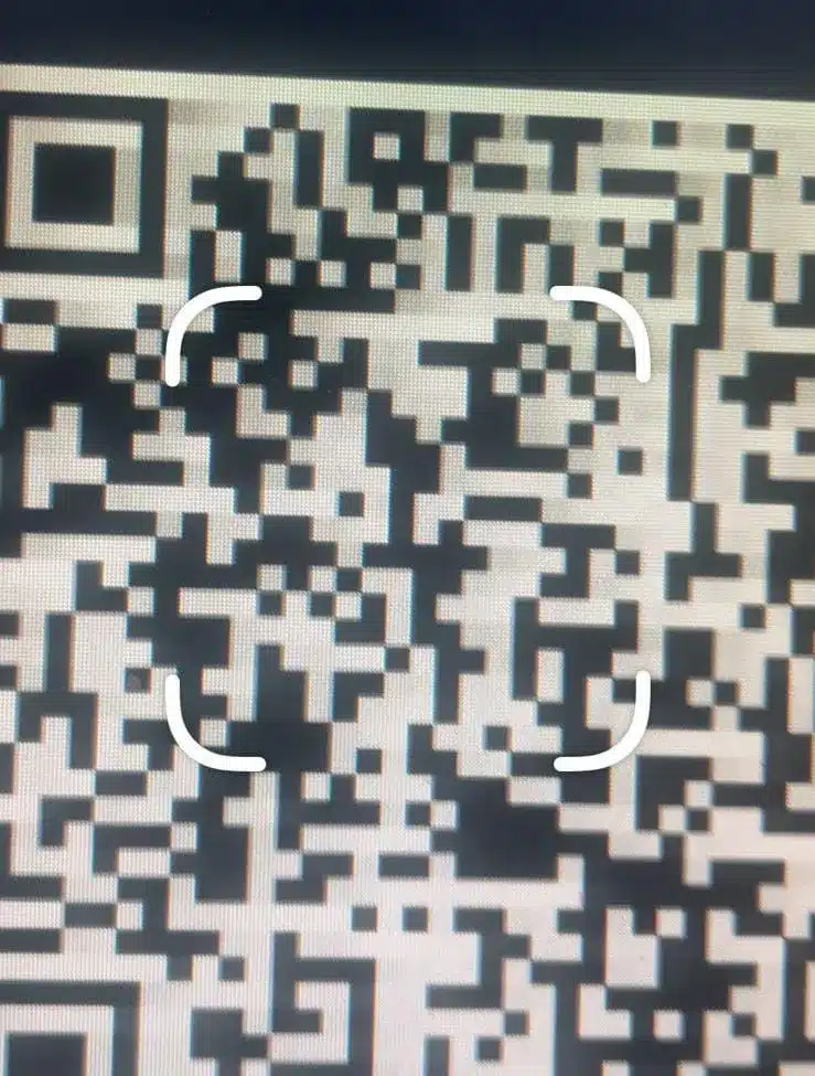 Place the QR code inside the box and hold your device steadily for a few seconds. 