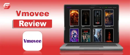 Laptop displaying movie posters for a Vmovee review.