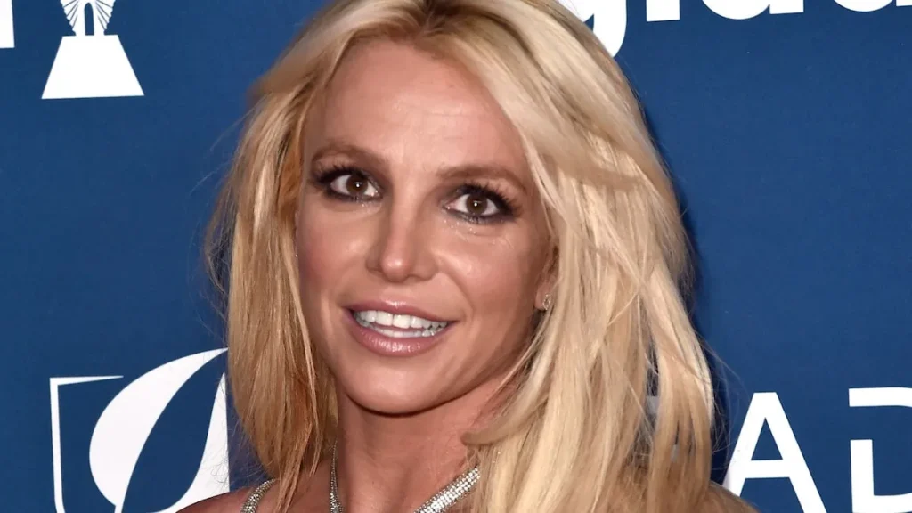 Portrait of Britney Spears with text "Britney Spears Arrested for DUI: Family Steps In Amid Emotional Struggle."